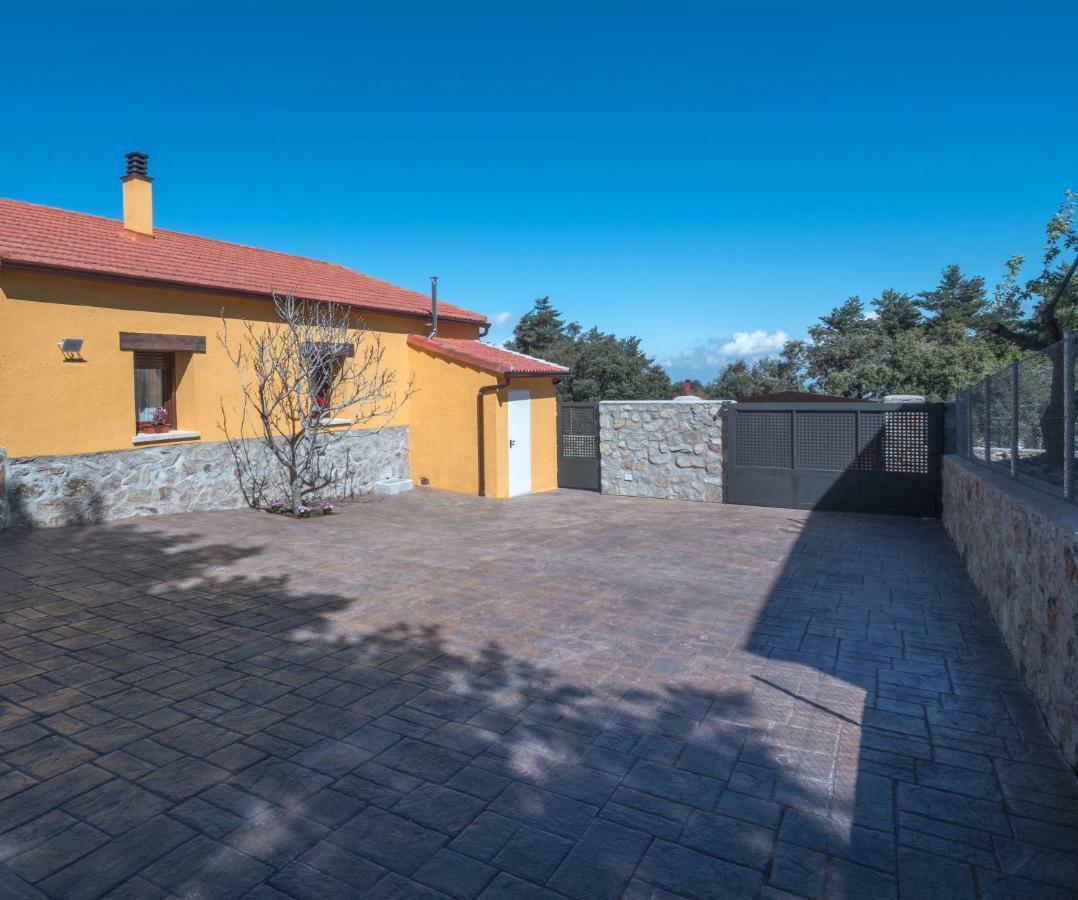 Casa Cantera Del Berrocal Ortigosa del Monte Bagian luar foto